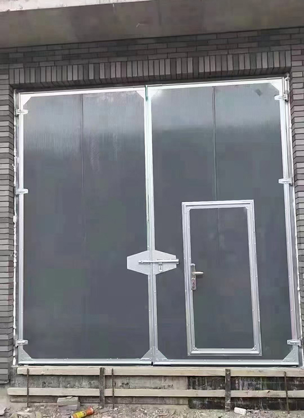 富县工业平开门在大型设备制造车间的应用实例